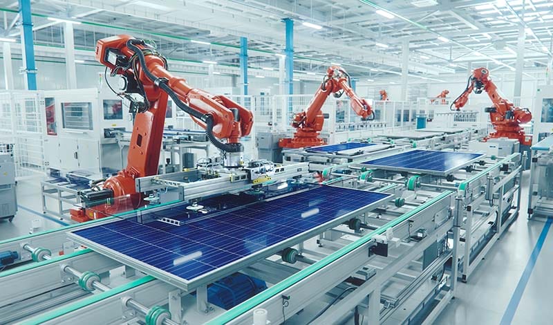 PEC's Programmable Robotic Arm - robot arms working in a production line