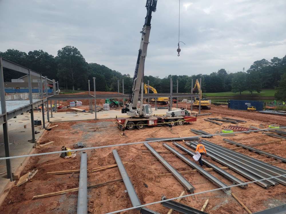 Industrial Construction Project with Structural Steel frame building and Crane